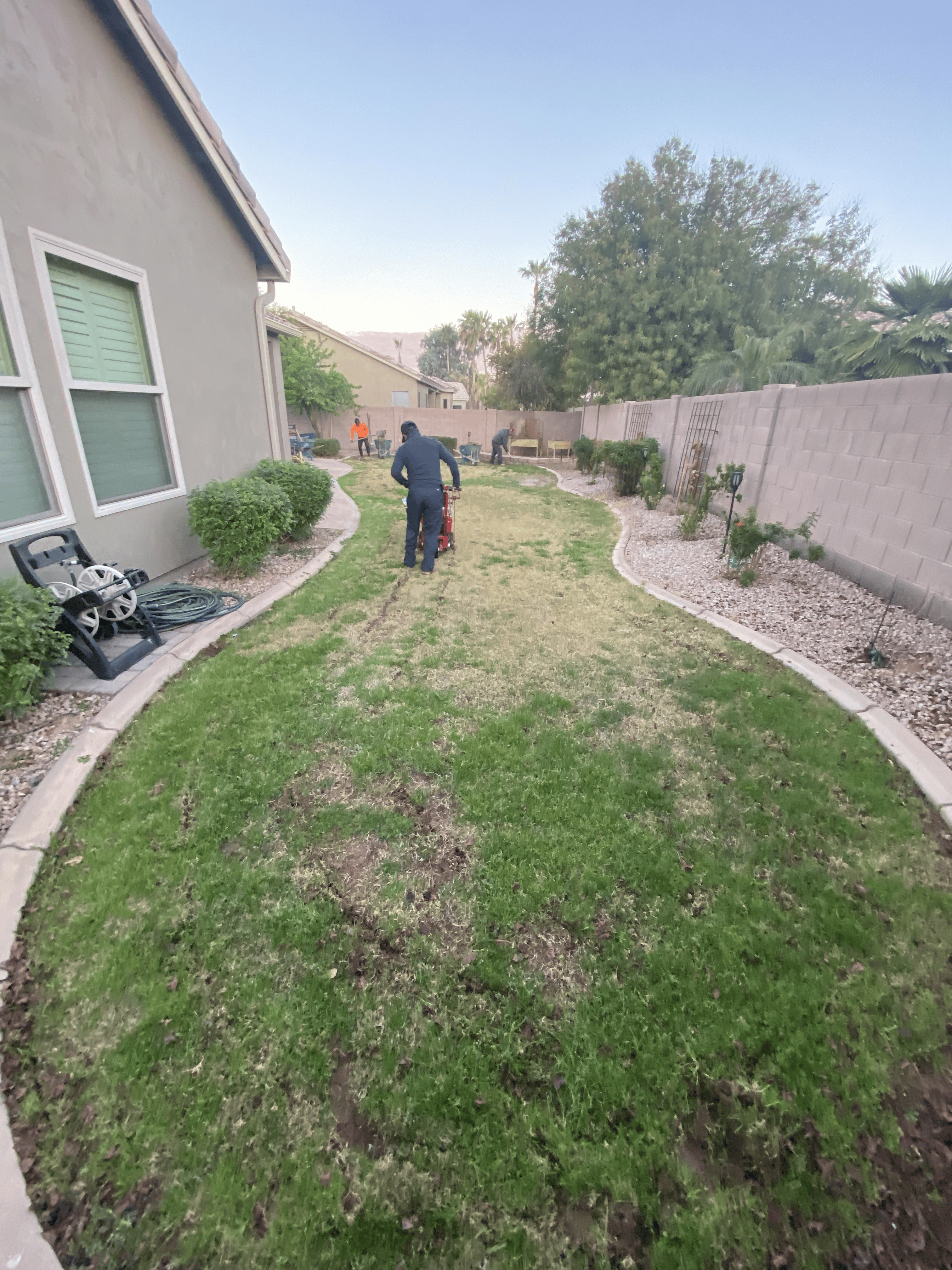 Crew performing lawn care and maintenance — Bull Horn Landscaping